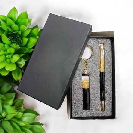 Personalized Pen & Keychain Gifts with Name Engraving | Pen for Gifting | Gift Set for Men & Women, Co Brand	blinkNshop Writing instrument form	Ballpoint Pen Colour	Black Ink Colour	Black Age Range (Description)	Adult About this item PRODUCT DETAILS:- Material: Metallic || Color: Black & Golden || Item Dimension: 3.25 x 6.25 Inch || Package Contain: Pack of 2 || To Customise Your Gold Flake Set Contact The Seller Trough "Seller Messaging Assistant" Under the 'Buyer-Seller Messaging Service. PRODUCT INCLUDED:- Customized gift set with pen with a keychain with your name Engraved on it. FOR GIFT:- Office Supplies, Corporate , anniversary gift, etc. Versatile Use: Ideal for on-the-go writing needs or as an emergency pen. Dual Functionality: Serves as both a reliable writing tool and a handy keychain accessory.rporate Gift Set, Customized Birthday Gift for Husband/Boyfriend/Brother/Wife - Image 3
